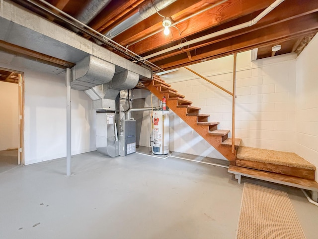 unfinished below grade area featuring heating unit, gas water heater, and stairway