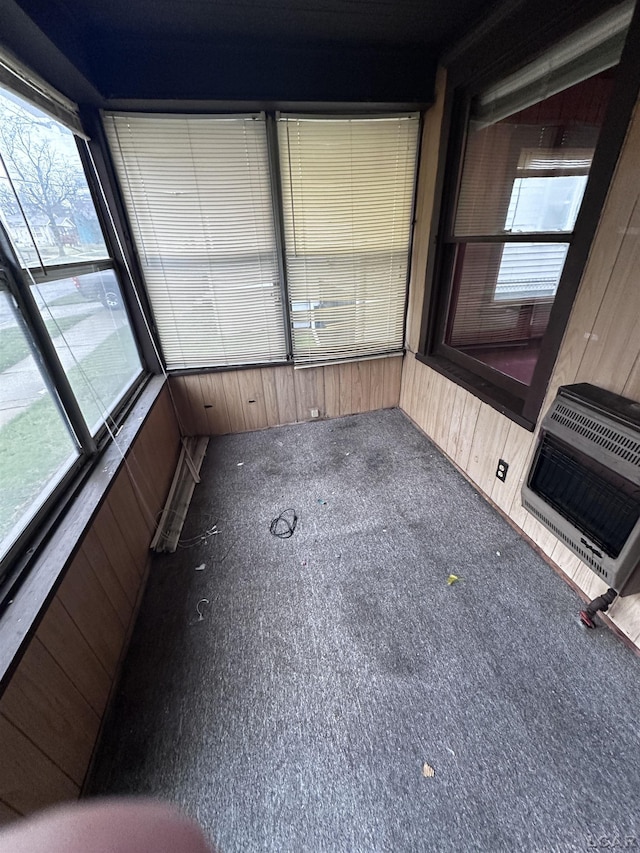 140 Moore St, Jackson, MI 49203 - unfurnished sunroom featuring heating unit