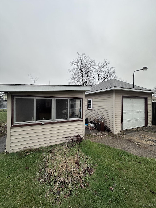 140 Moore St, Jackson, MI 49203 - exterior space with a garage