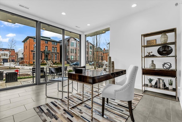 248 Alfred St, Detroit, MI 48201 - tiled dining room featuring floor to ceiling windows, recessed lighting, and visible vents