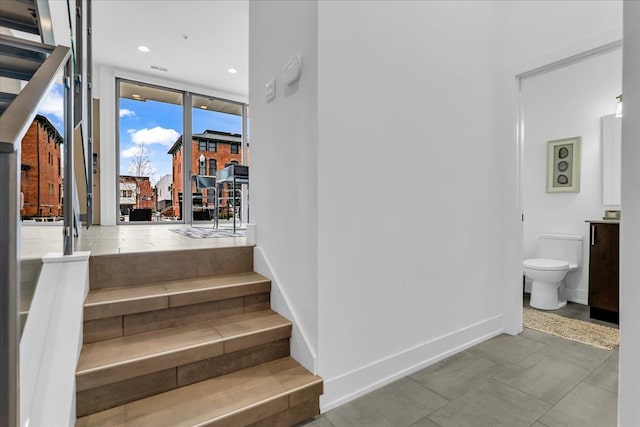 248 Alfred St, Detroit, MI 48201 - staircase with expansive windows, recessed lighting, and baseboards