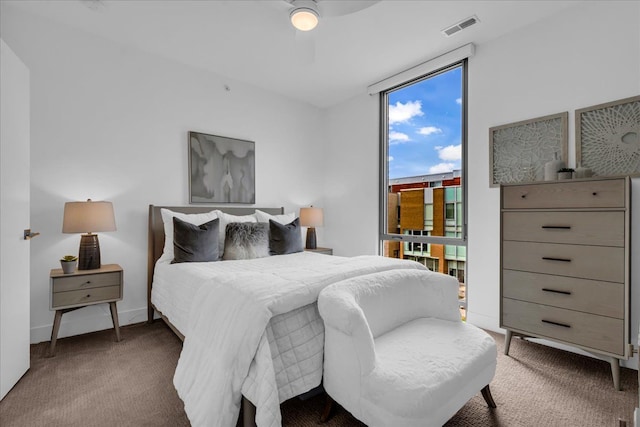248 Alfred St, Detroit, MI 48201 - bedroom with multiple windows, carpet, a ceiling fan, and visible vents