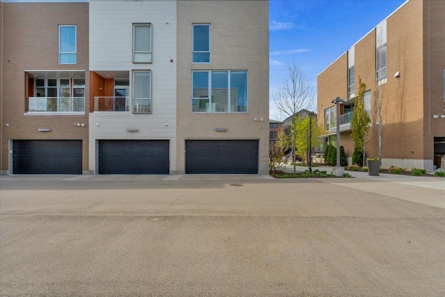 248 Alfred St, Detroit, MI 48201 - exterior space featuring an attached garage