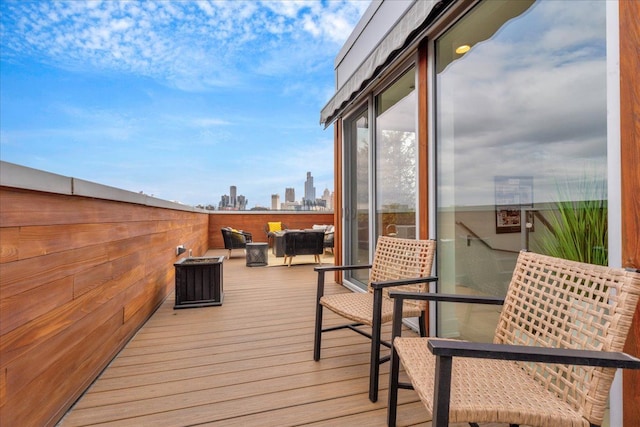 248 Alfred St, Detroit, MI 48201 - wooden deck featuring a city view