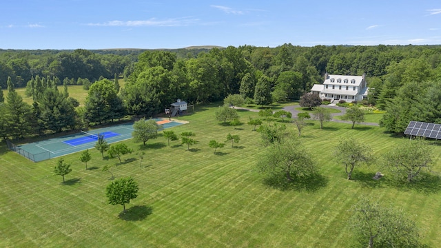 drone / aerial view with a view of trees