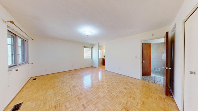 3375 Riverbend Dr, Ann Arbor, MI 48105 - spare room with plenty of natural light and baseboards