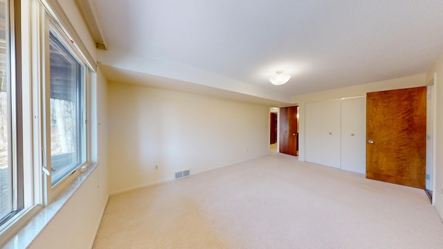 3375 Riverbend Dr, Ann Arbor, MI 48105 - unfurnished bedroom featuring carpet and a closet