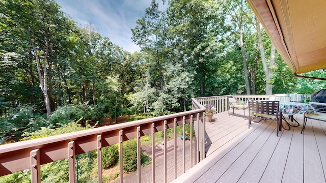 3375 Riverbend Dr, Ann Arbor, MI 48105 - wooden terrace with outdoor dining area