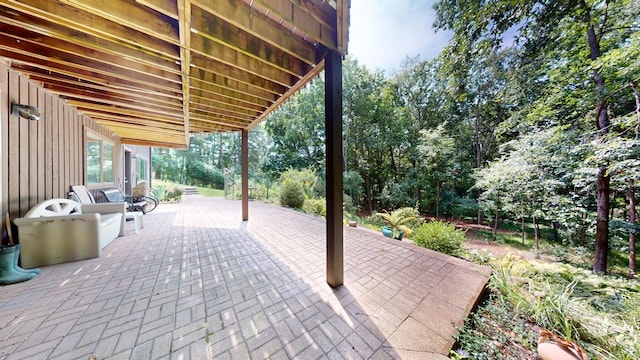 3375 Riverbend Dr, Ann Arbor, MI 48105 - view of patio / terrace featuring view of wooded area