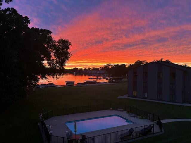 1 Hiawatha Cove Trl Unit 21, Battle Creek, MI 49015 - view of swimming pool with a water view
