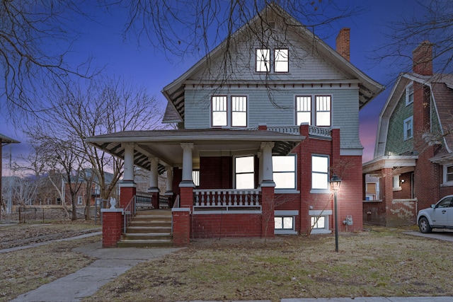 250 Alger St, Detroit, MI 48202 - american foursquare style home featuring a porch and a chimney