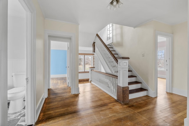 250 Alger St, Detroit, MI 48202 - stairs with wood-type flooring, baseboards, and crown molding