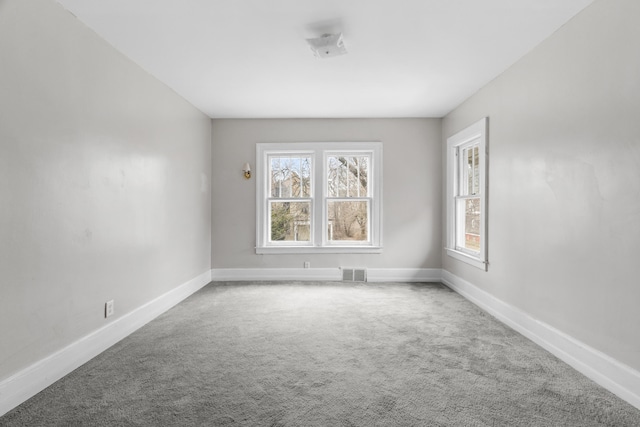 250 Alger St, Detroit, MI 48202 - unfurnished room with baseboards, a wealth of natural light, visible vents, and carpet floors