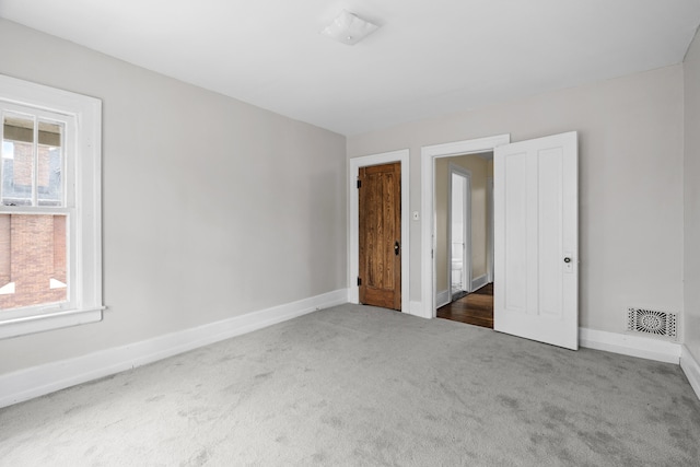 250 Alger St, Detroit, MI 48202 - unfurnished bedroom featuring visible vents, baseboards, and carpet floors