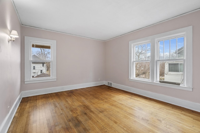 250 Alger St, Detroit, MI 48202 - spare room featuring hardwood / wood-style floors, visible vents, baseboards, and plenty of natural light