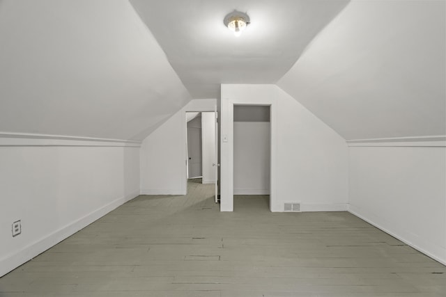 250 Alger St, Detroit, MI 48202 - bonus room with baseboards, wood-type flooring, lofted ceiling, and visible vents