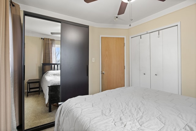 bedroom featuring a closet, a ceiling fan, and carpet floors
