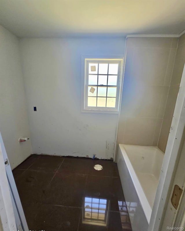 8475 Stout Ave, Warren, MI 48093 - full bathroom with tile patterned floors and a bath