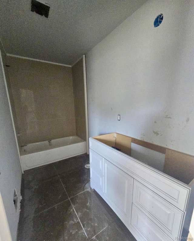 8475 Stout Ave, Warren, MI 48093 - bathroom featuring a tub to relax in and tile patterned flooring