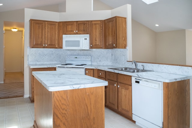 kitchen featuring lofted ceiling, light floors, white appliances, a sink, and brown cabinets