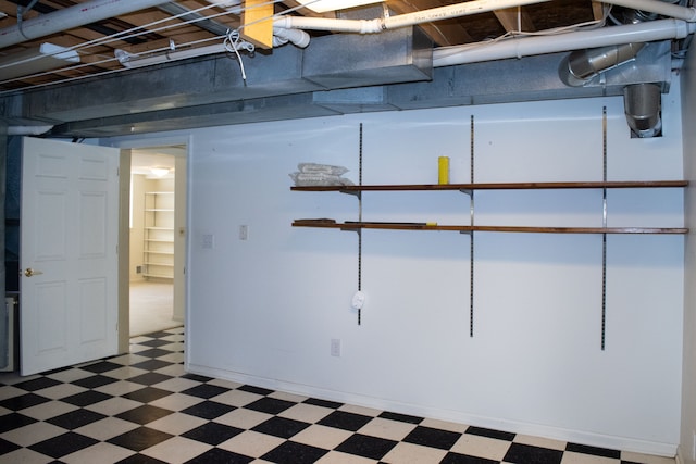 basement with tile patterned floors