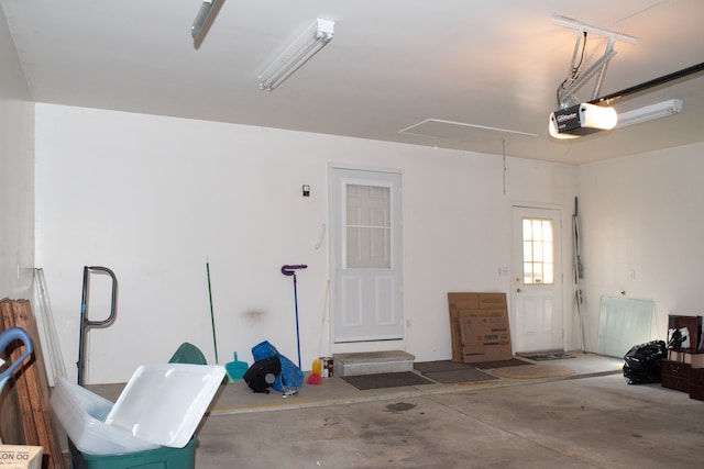 garage featuring a garage door opener