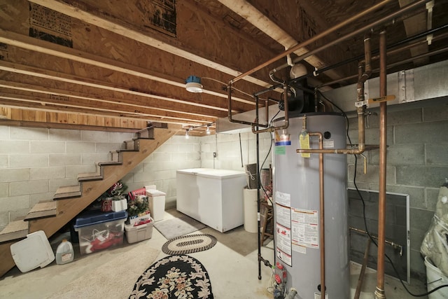 unfinished below grade area with stairs and gas water heater