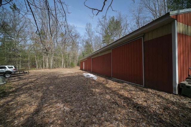 exterior space featuring an outbuilding
