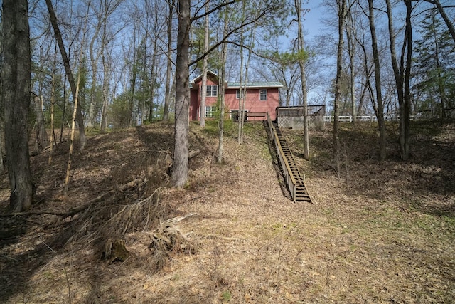 view of yard featuring stairs