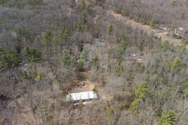 drone / aerial view with a view of trees