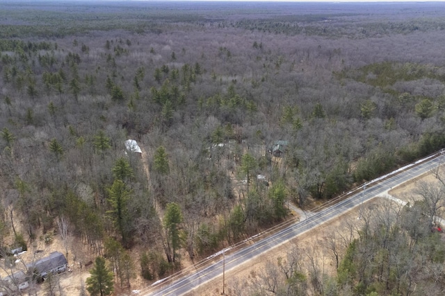 drone / aerial view with a rural view and a view of trees