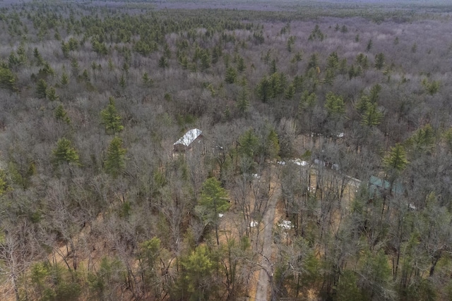 aerial view featuring a view of trees