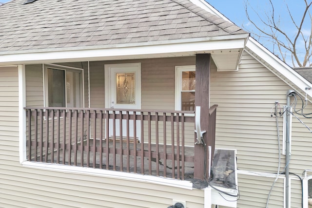 3628 Ford Ave, Jackson, MI 49203 - view of property exterior featuring roof with shingles and a porch