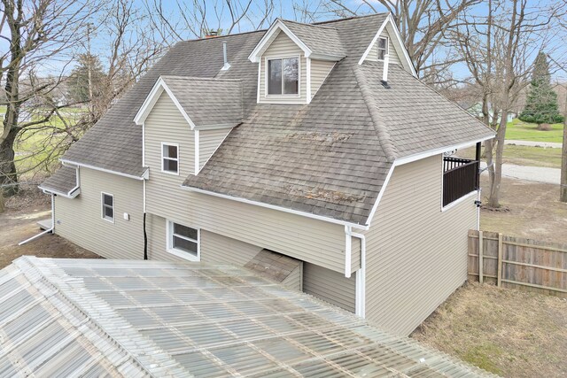 3628 Ford Ave, Jackson, MI 49203 - view of side of property with fence and a shingled roof