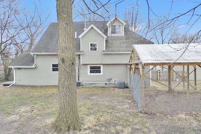 3628 Ford Ave, Jackson, MI 49203 - back of house with roof with shingles and cooling unit