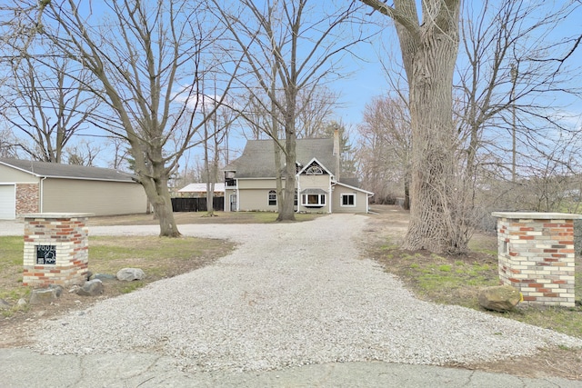3628 Ford Ave, Jackson, MI 49203 - view of front of home with driveway and a shingled roof