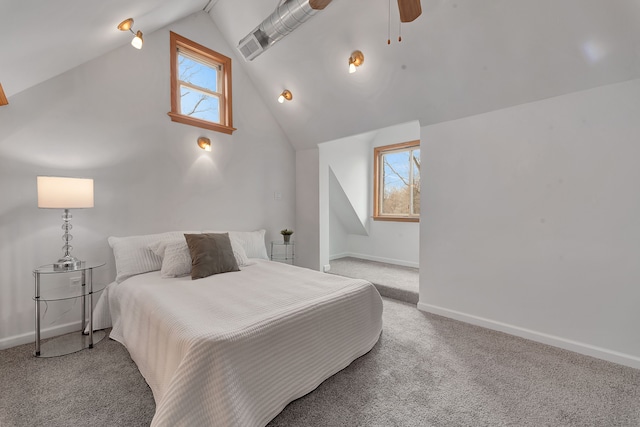 3628 Ford Ave, Jackson, MI 49203 - bedroom featuring ceiling fan, vaulted ceiling, baseboards, and light carpet