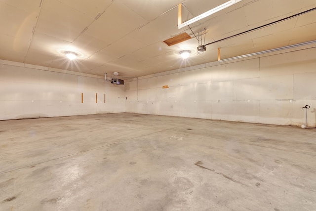 3628 Ford Ave, Jackson, MI 49203 - parking garage featuring a garage door opener