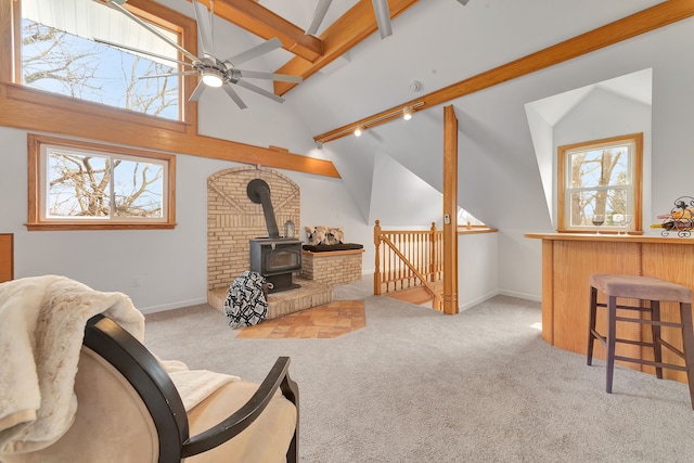 3628 Ford Ave, Jackson, MI 49203 - living area featuring track lighting, carpet floors, ceiling fan, and lofted ceiling with beams