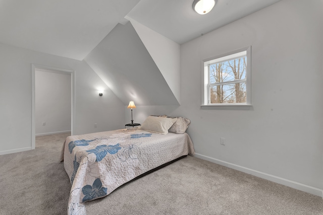 3628 Ford Ave, Jackson, MI 49203 - carpeted bedroom with lofted ceiling and baseboards
