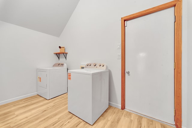 3628 Ford Ave, Jackson, MI 49203 - laundry room featuring washer and dryer, baseboards, light wood finished floors, and laundry area