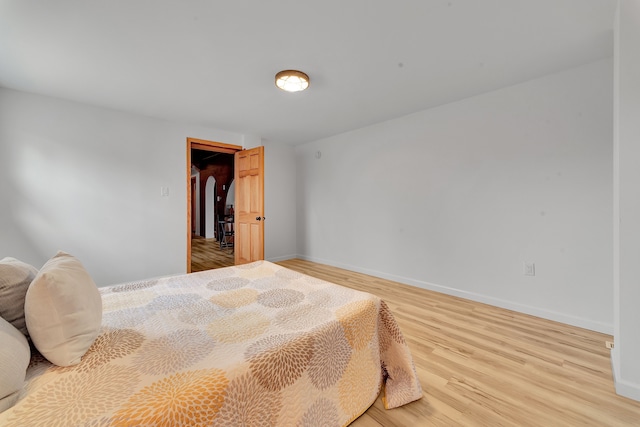 3628 Ford Ave, Jackson, MI 49203 - bedroom with baseboards and light wood-style floors