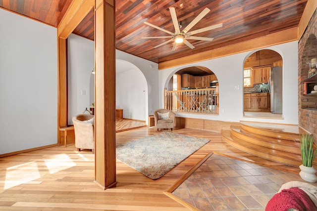 3628 Ford Ave, Jackson, MI 49203 - living area with wooden ceiling, arched walkways, a ceiling fan, and light wood finished floors