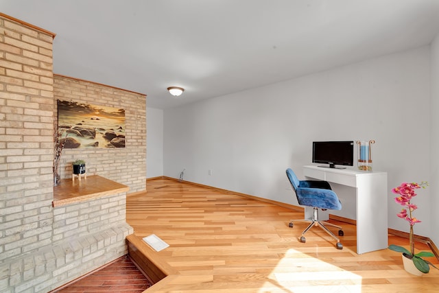3628 Ford Ave, Jackson, MI 49203 - unfurnished office featuring wood finished floors and baseboards