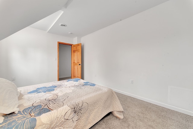3628 Ford Ave, Jackson, MI 49203 - bedroom with baseboards, visible vents, and carpet