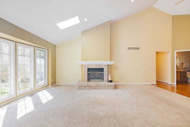 7837 Oak River Dr, Grosse Ile, MI 48138 - unfurnished living room with high vaulted ceiling, carpet, visible vents, and a skylight