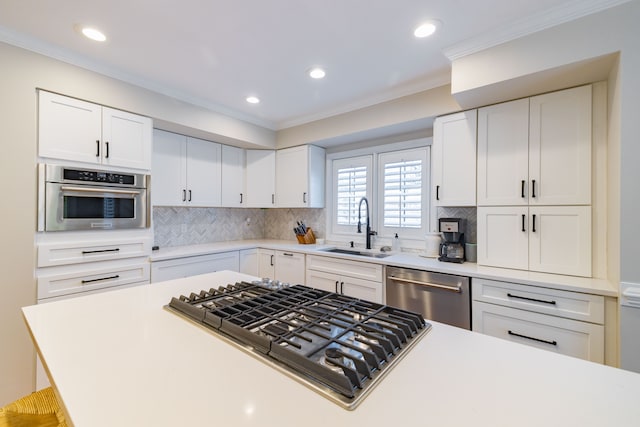 7837 Oak River Dr, Grosse Ile, MI 48138 - kitchen featuring a sink, light countertops, recessed lighting, and stainless steel appliances
