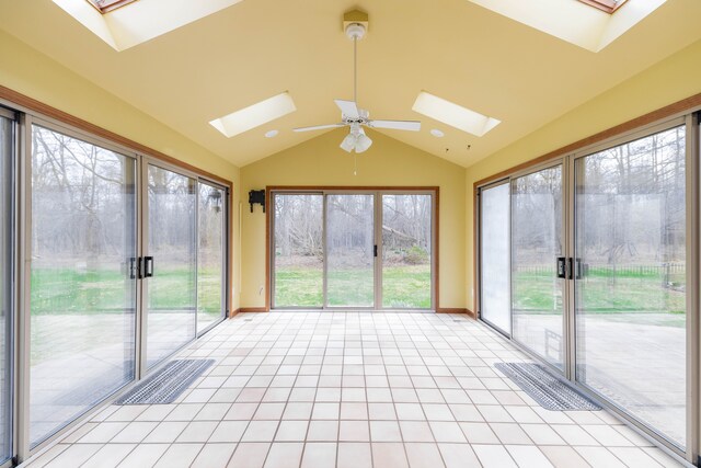 7837 Oak River Dr, Grosse Ile, MI 48138 - unfurnished sunroom featuring plenty of natural light, baseboards, tile patterned flooring, and lofted ceiling with skylight