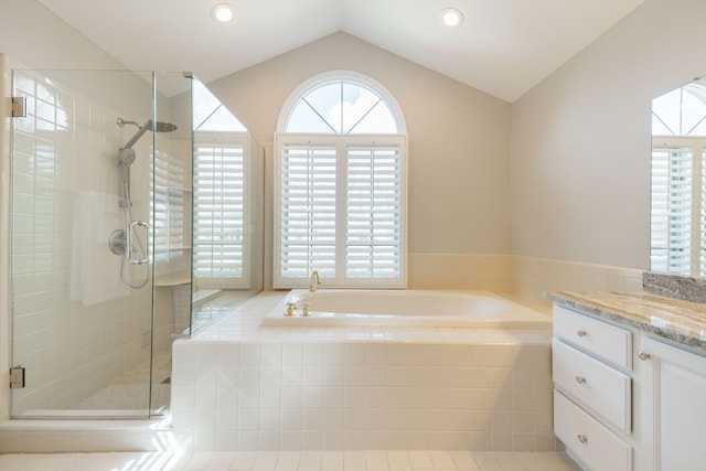 7837 Oak River Dr, Grosse Ile, MI 48138 - bathroom featuring a shower stall, vanity, a bath, and vaulted ceiling