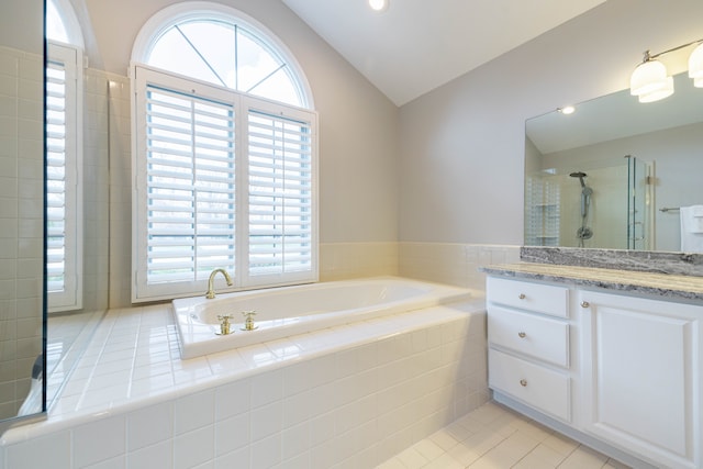 7837 Oak River Dr, Grosse Ile, MI 48138 - bathroom featuring a shower stall, a wealth of natural light, a bath, and lofted ceiling